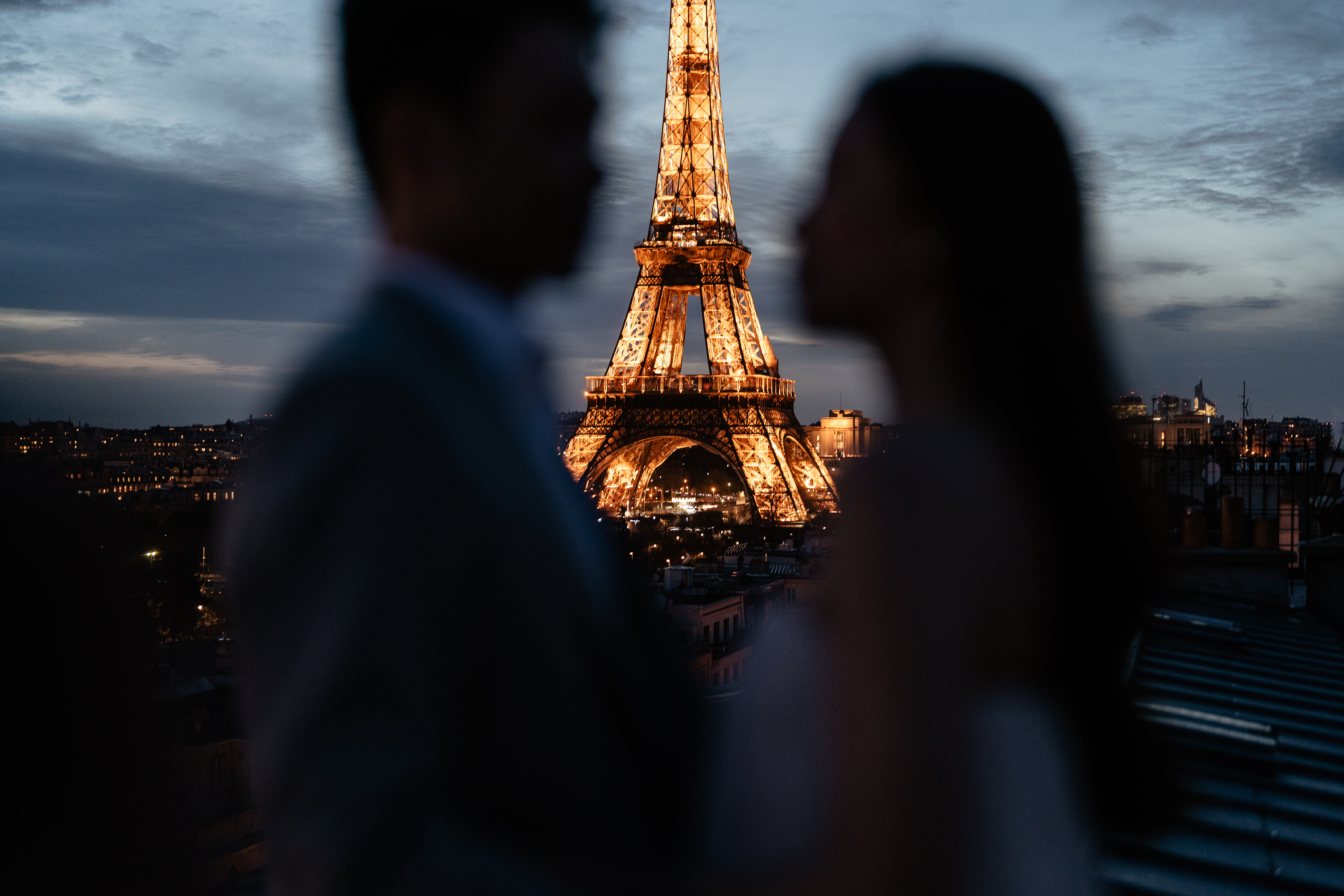 Couples Sunset Pre-wedding Photoshoot in Parisian rooftop with Eiffel tower view 