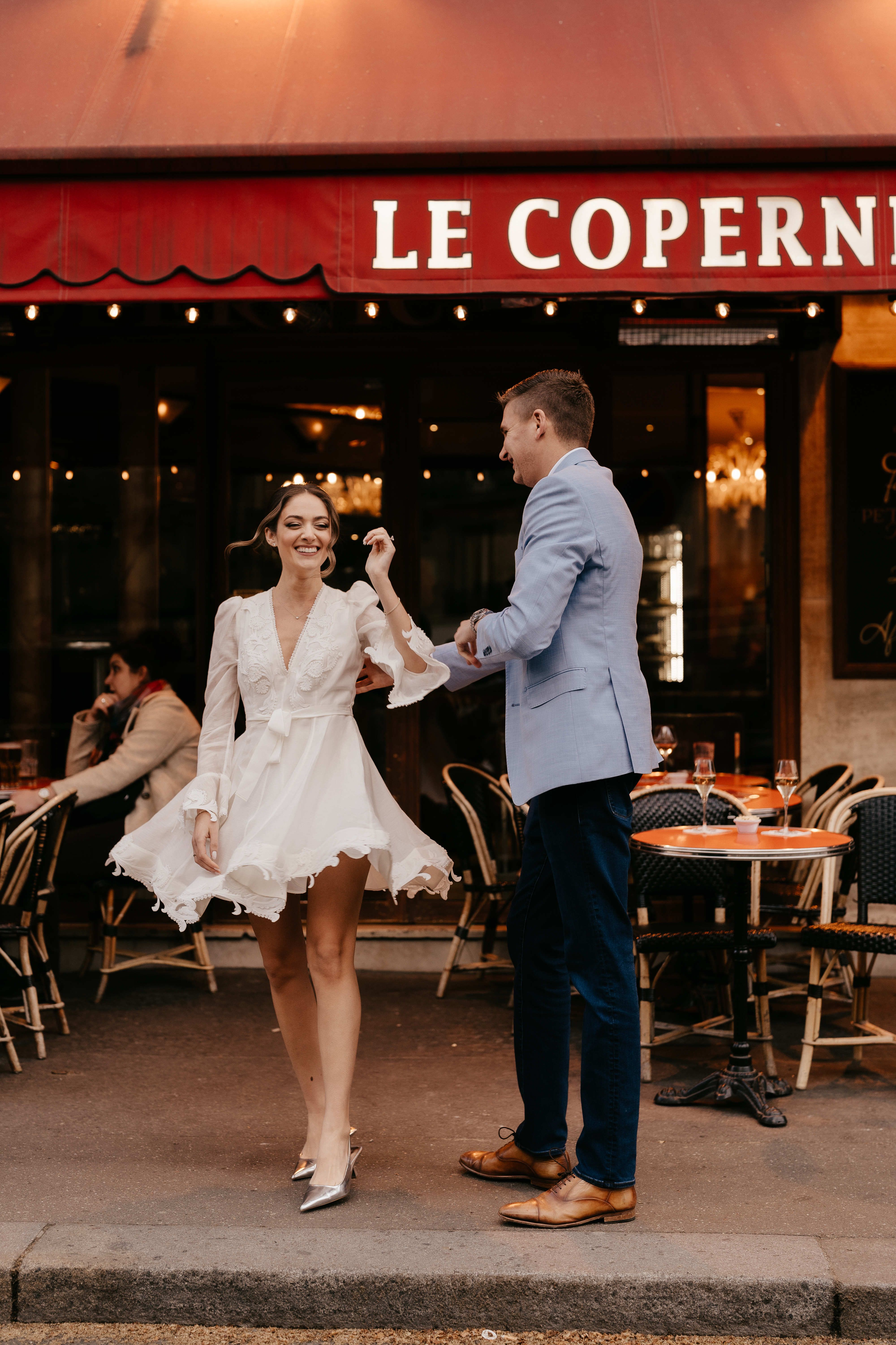 Couples Night engagement Photoshoot in Paris streets cafe
