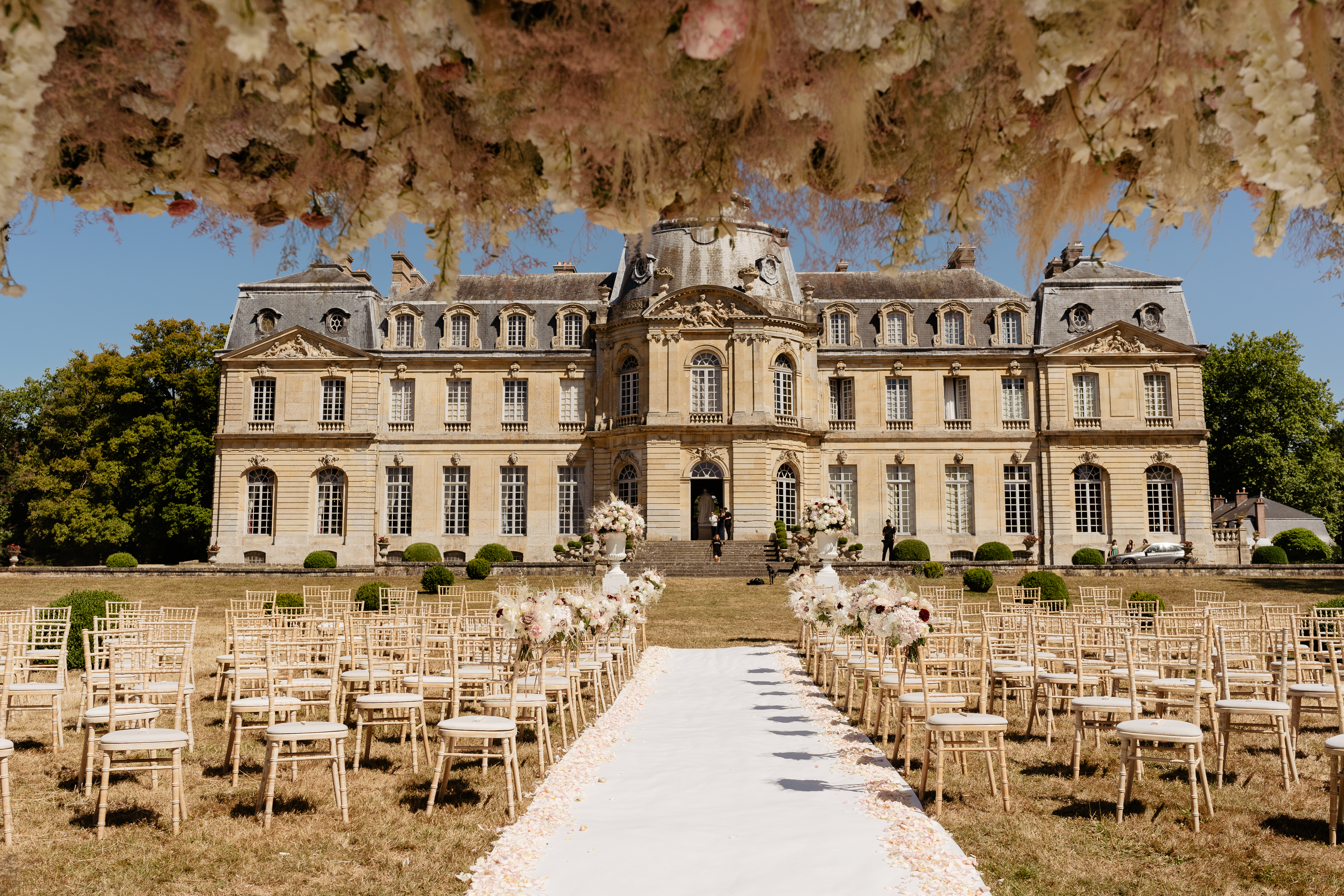 French Destination Wedding at Chateau de Champlatreux ceremony decorations 