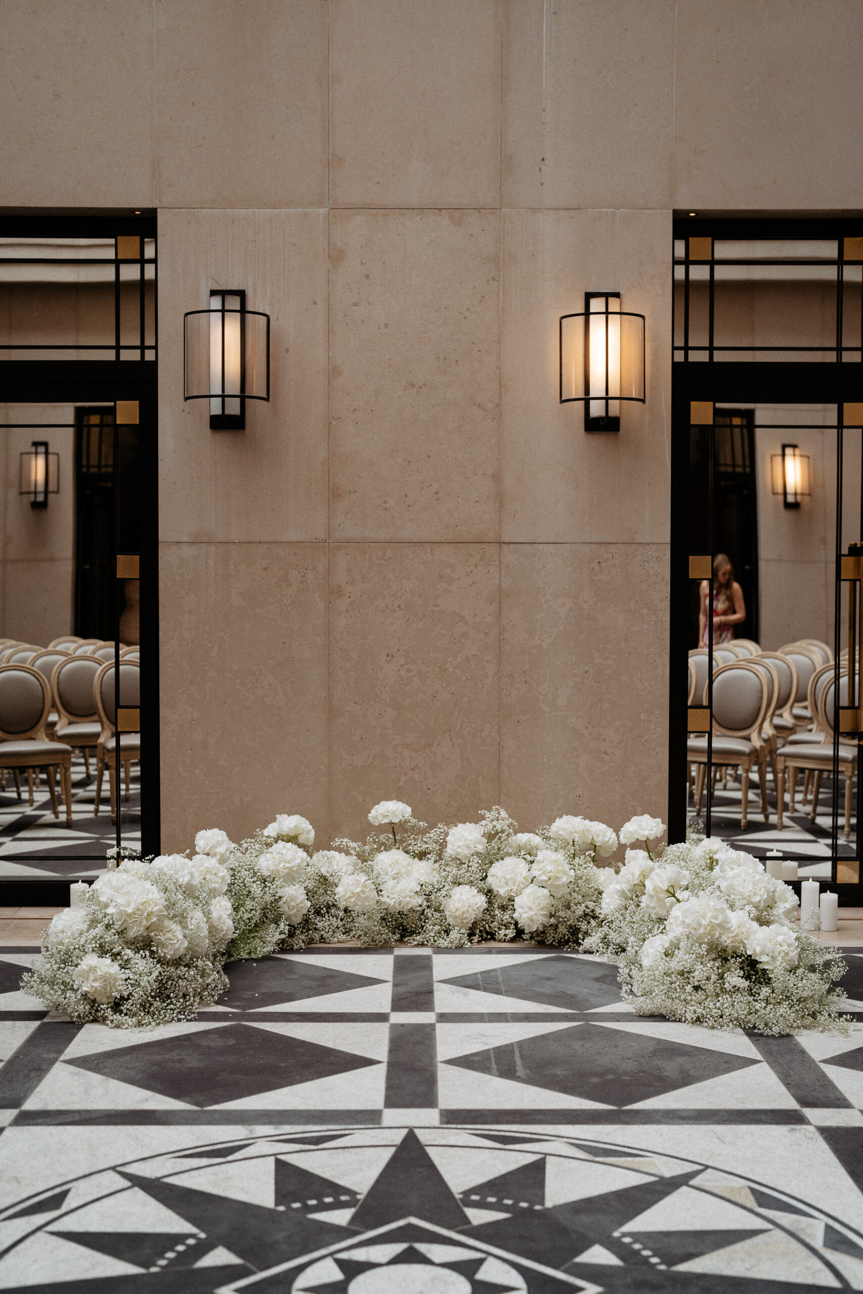Wedding ceremony at Four Seasons hotel George V Paris with white flower decoration 