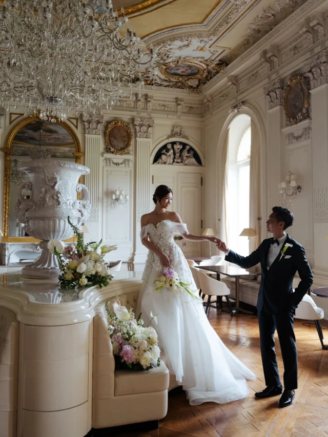Some days you just get the whole château to yourselves. ✨  Ferrières gave us all of it in one afternoon: the painted ballroom, a white Mustang waiting at the end of the cypress alley, flowers across the hood.  Just the two of them: a twirl in the gallery, a run down the cobbles, one quiet moment before we sent the drone up.  @twy_jacinta x @davidtotc 
Photos & video @throughtheglassparis 
Venue @chateaudeferrieres 
Bridal shop @thebrideparis.official 
Florals @laplumefleurparis 
MUAH @crystalbride77